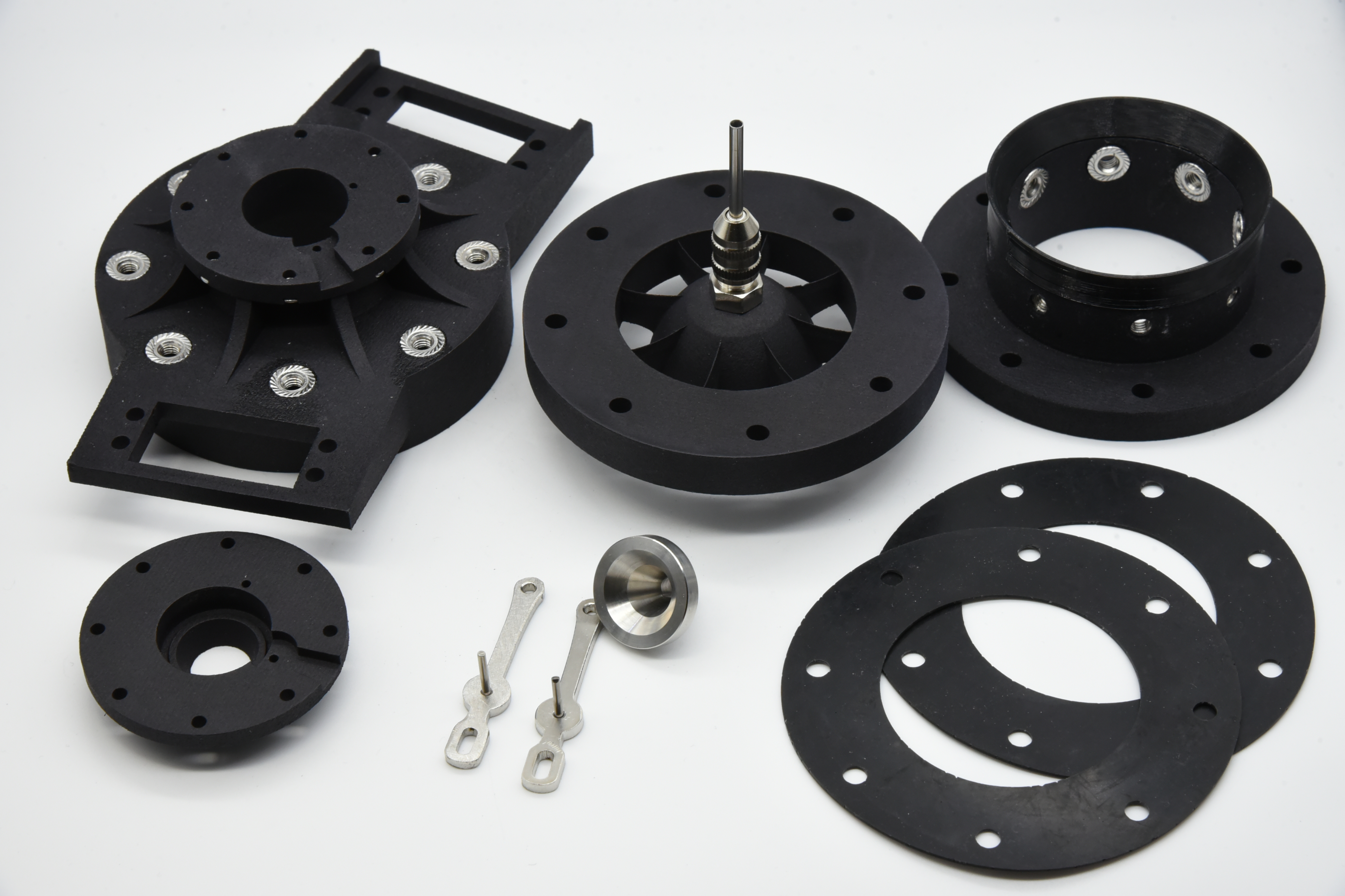 Graphic of a typography specimen showing the alphabet and numerals on top of a dark gray background.